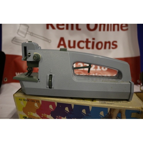 499 - Vintage Boxed Ronco Cordless Electric Portable Sewing Machine