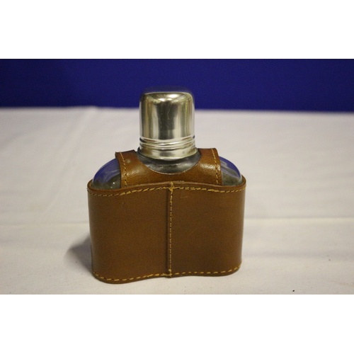 509 - Medium Sized Hip Flask with Leather Covering and Lid Cup