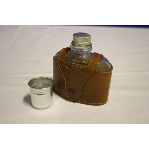 509 - Medium Sized Hip Flask with Leather Covering and Lid Cup