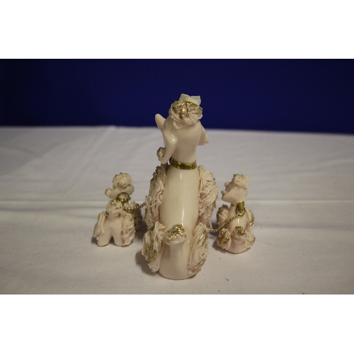 510 - Vintage Trio of Poodles, Mother and Pups in Pottery. Pale Pink Shade.