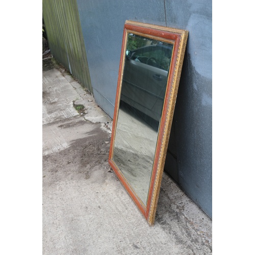 562 - Large Heavy Bevelled Glass Mirror in Ornate Surround. Very expensive when new.