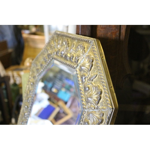 680 - Copper Covered Ornate Large Mirror
H 74cm
W 44cm