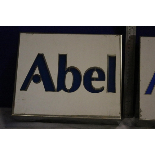 24 - Pair of Light Up Signs from Abel