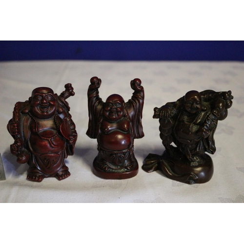 54 - Collection of 3 Small Composite Red Buddhas