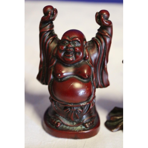 54 - Collection of 3 Small Composite Red Buddhas