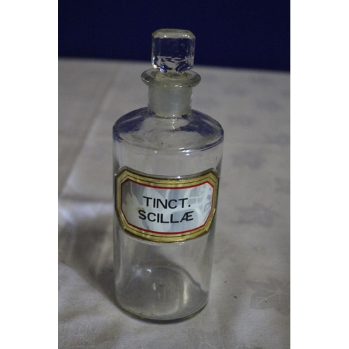 125 - Vintage Apothecary Glass Bottle with Stopper Top and Label