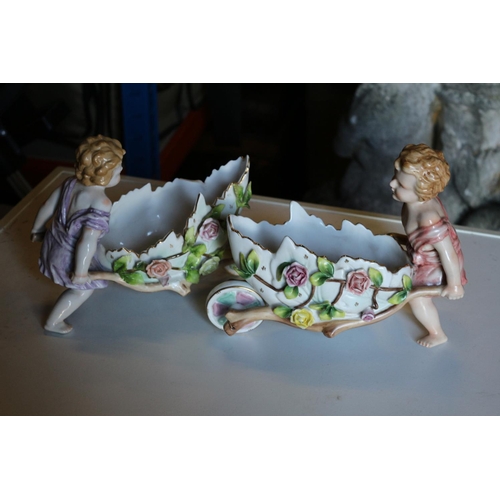 190 - Pair of Porcelain Cildren pushing Flower Covered Wheelbarrows - In the Style of Meissen