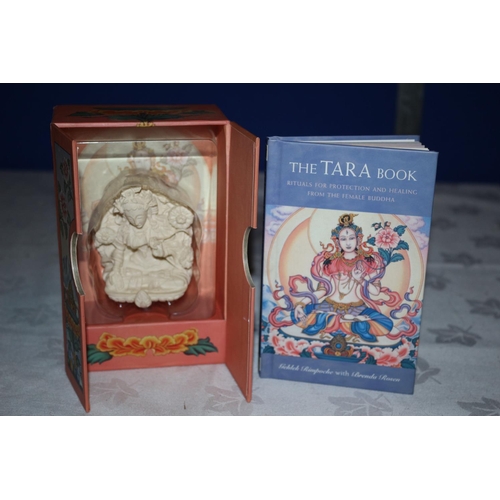 667 - Book and Statue of Tara