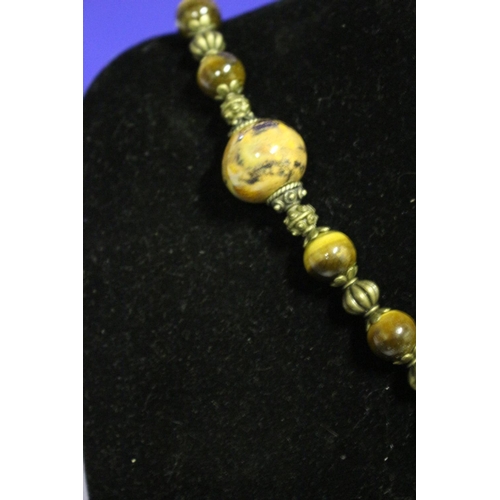 668 - Tigers Eye Long Necklace with Chinese Figures Head made from Wood