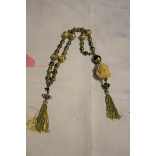 668 - Tigers Eye Long Necklace with Chinese Figures Head made from Wood