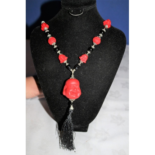 669 - Red Faux Coral Buddha Head and Beads - Faux Cinnabar Black Agate Beads