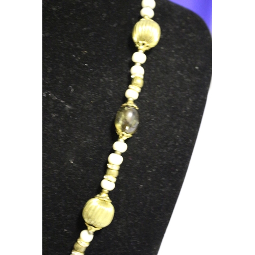 673 - Bone Pendant with Flower Decoration and Beaded Chain