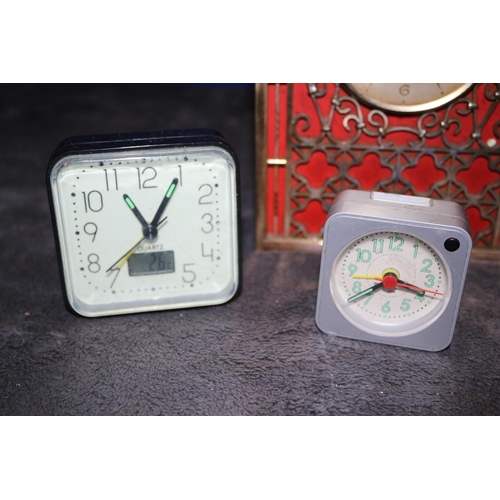 37 - 3 x Clocks - Two Travel and One Unusual Metal Tempora Clock with Ornate Design Work