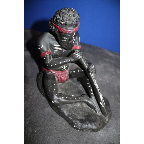 81 - Aborigine Figure with his Digeridoo Pottery Piece