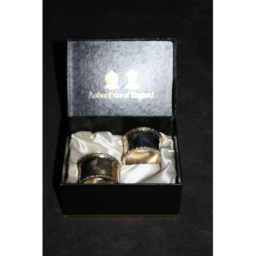 130 - Pair of White Metal Napkin Rings in Presentation Box