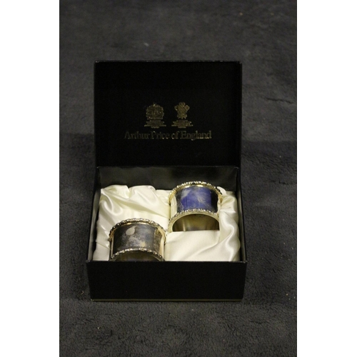 130 - Pair of White Metal Napkin Rings in Presentation Box