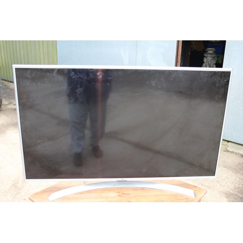 132 - LG Flat Screen Smart TV - 49in. with Remote not tested but believed to be working plus Antiqued Pine... 