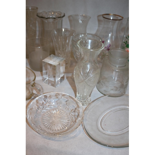 100 - A large assortment of clear glass including a paperweight