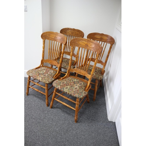 104 - 4 Highly carved and decorative Malaysian wooden dining chairs