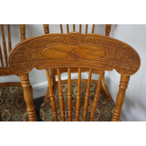 104 - 4 Highly carved and decorative Malaysian wooden dining chairs