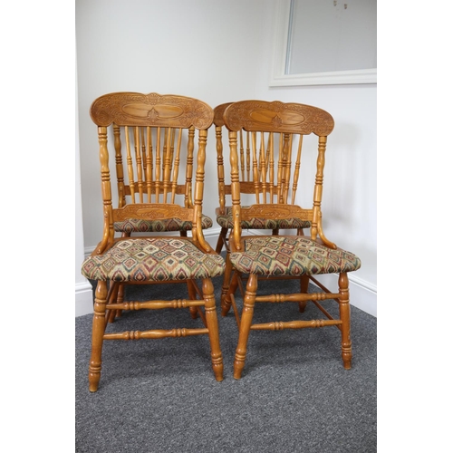 104 - 4 Highly carved and decorative Malaysian wooden dining chairs