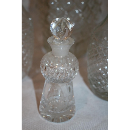 111 - 5 Cut Glass items including decanters and oil and vinegar dispensers