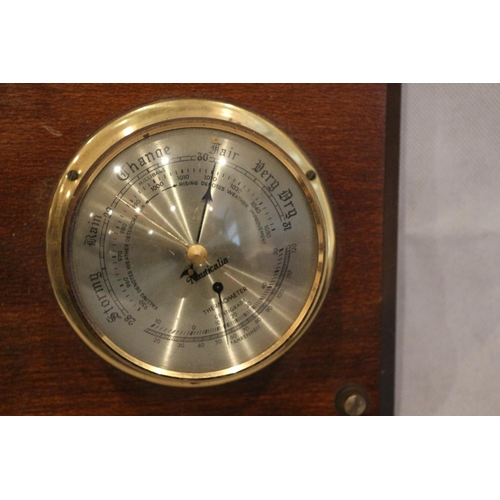 123 - Barometer and clock mounted on wood