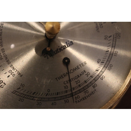 123 - Barometer and clock mounted on wood