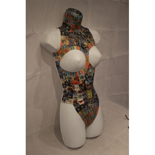 140 - Unusual half plastic manikin with stamp pattern cover