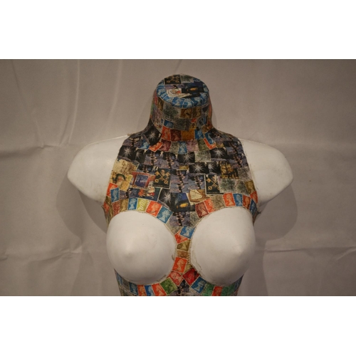 140 - Unusual half plastic manikin with stamp pattern cover