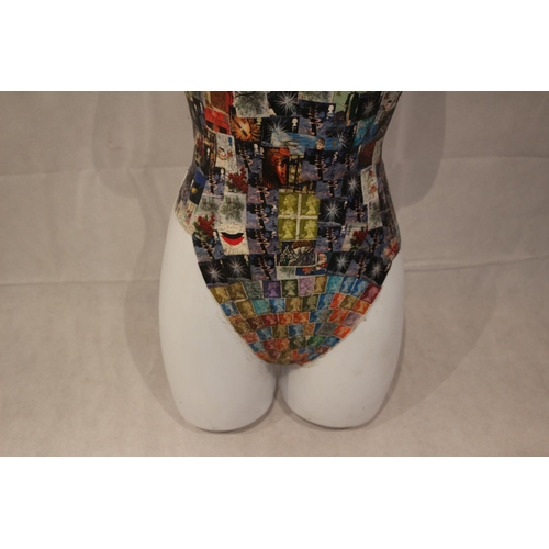 140 - Unusual half plastic manikin with stamp pattern cover