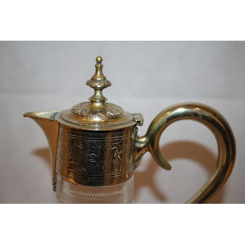 142 - Plated pull back lid top claret jug