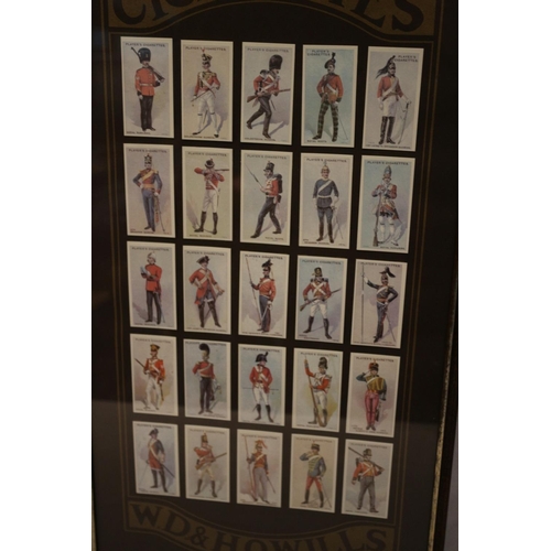 168 - Wills Cigarette Cards in Display case. Military