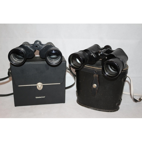 181 - 2 Pairs of Binoculars in cases, One by Tasco  20x50 and one by Tohoy of Japan 10x50