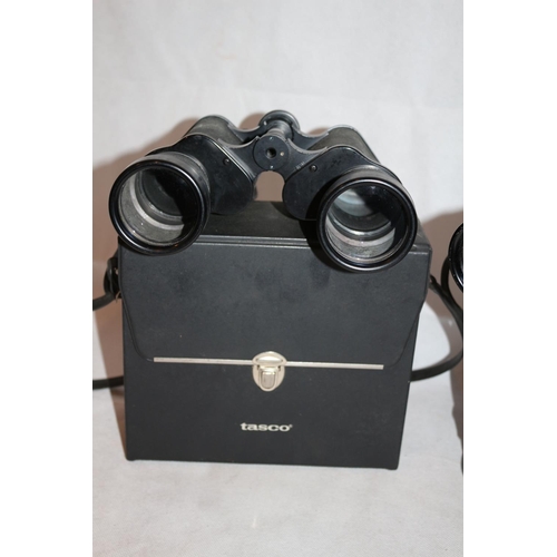 181 - 2 Pairs of Binoculars in cases, One by Tasco  20x50 and one by Tohoy of Japan 10x50