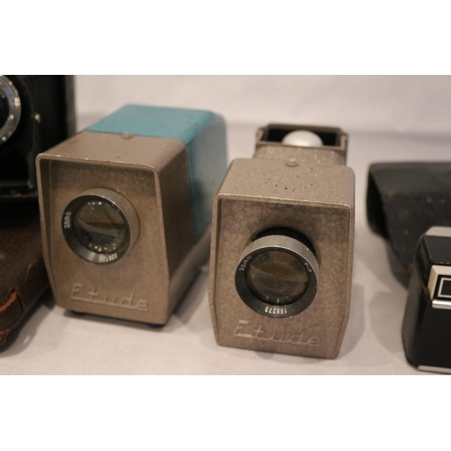 182 - A selection of photographic equipment, including cased Kodak bellow camera, Instamatic 100, Etude pr... 