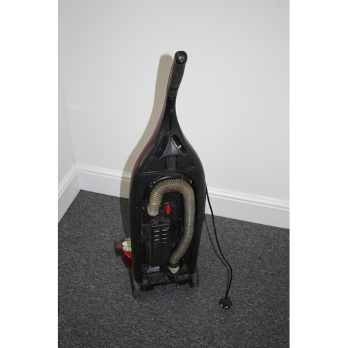 190 - A used working Bissell bag less vacuum cleaner