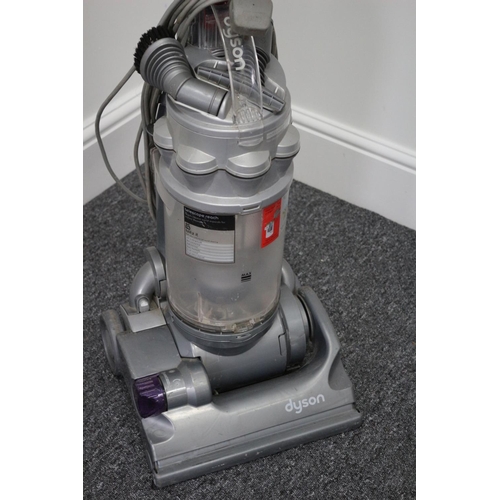 191 - A used working Dyson up right vacuum cleaner