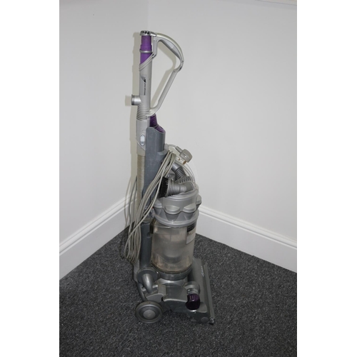 191 - A used working Dyson up right vacuum cleaner