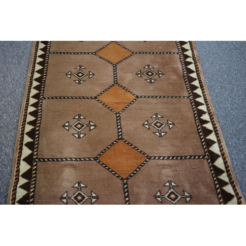 195 - Lovely large runner rug from Bucharest, 10ft 6ins x 3ft 4ins. still with original label