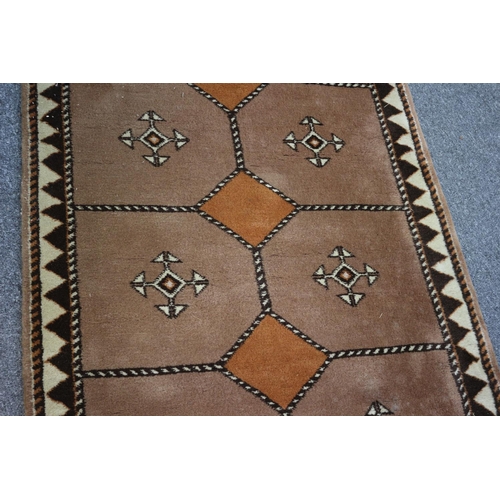 195 - Lovely large runner rug from Bucharest, 10ft 6ins x 3ft 4ins. still with original label