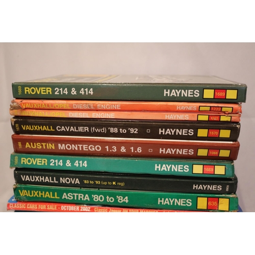 198 - A selection of motoring books and manuals including 12 Haynes manuals. Motoring Fan and clock