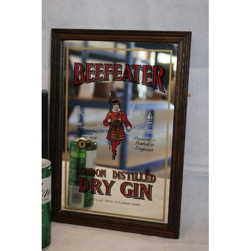 2 - It's Gin o'clock with a working Gin o'clock clock, a Beefeater advertising mirror. A tin of Gin and ... 