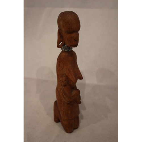 220 - African tribal mask and wooden statue of mother and child