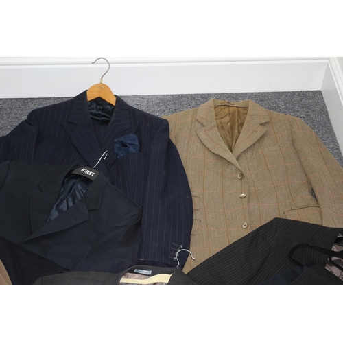 235 - A selection of used mainly gents suits, trousers jacket and coat