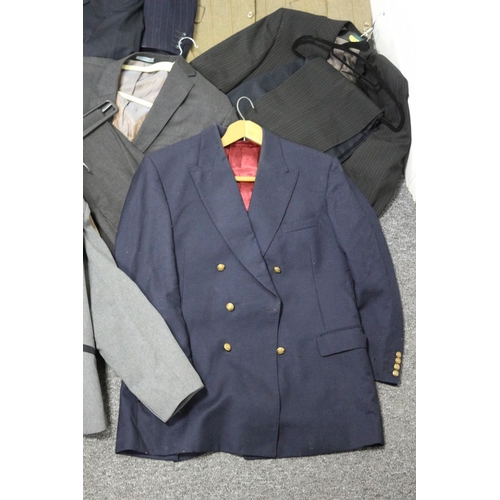 235 - A selection of used mainly gents suits, trousers jacket and coat