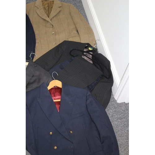 235 - A selection of used mainly gents suits, trousers jacket and coat