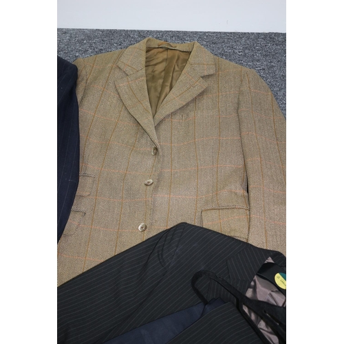 235 - A selection of used mainly gents suits, trousers jacket and coat