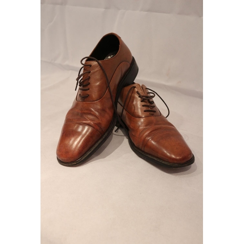 37 - A pair of brown Mark and Spencer's lace up shoes. Believed to be size 9