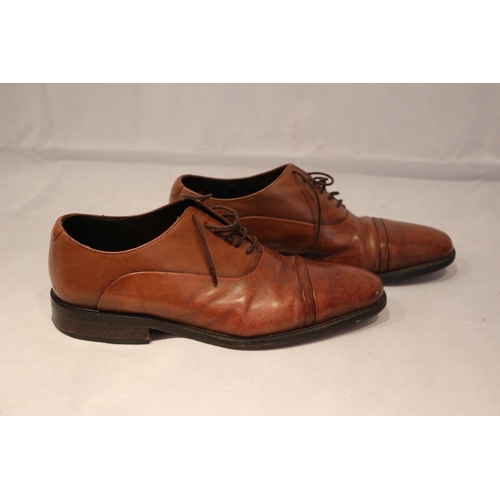 37 - A pair of brown Mark and Spencer's lace up shoes. Believed to be size 9